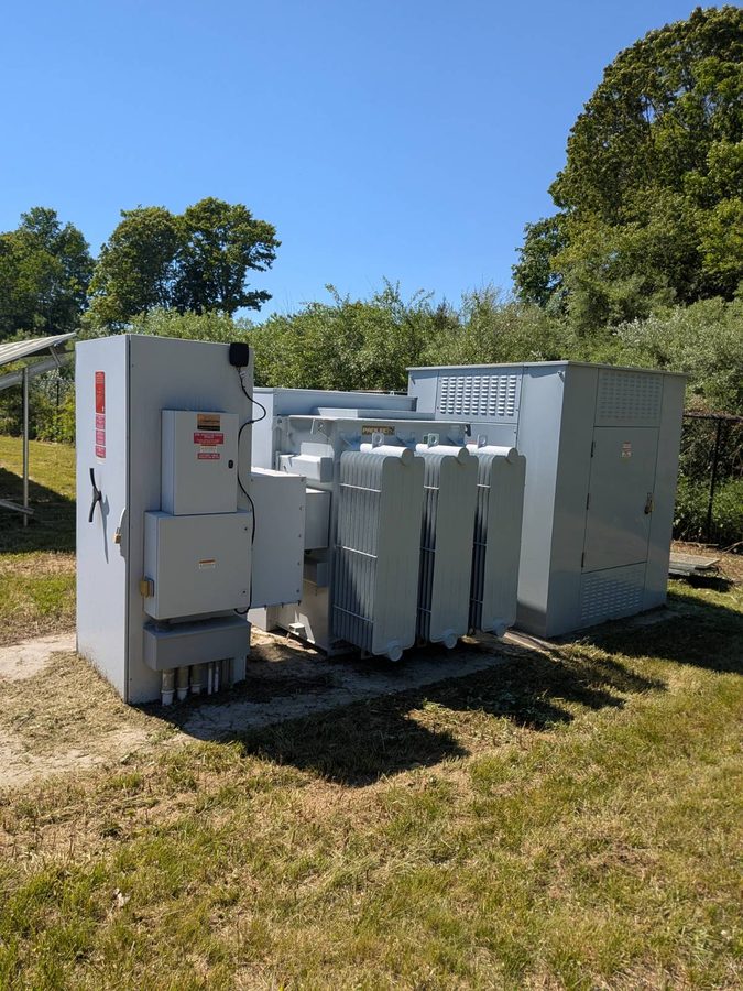 Transformer and switchgear on a mowed equipment pad